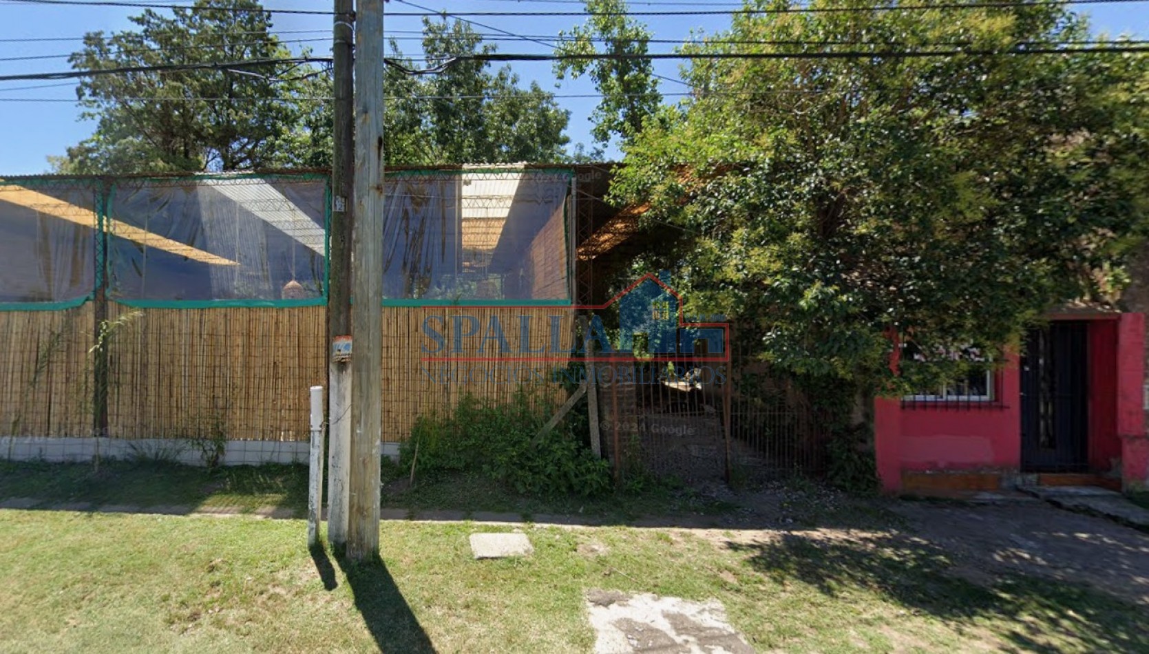 LOTE CON LOCALES EN CENTRO DE MANZANARES - OPORTUNIDAD DE INVERSION